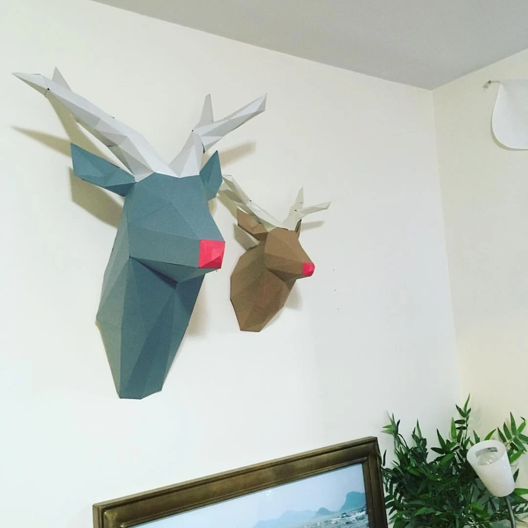 Red nose reindeer head papercraft. You get PDF digital file templates and instructions for these DIY modern paper sculpture.