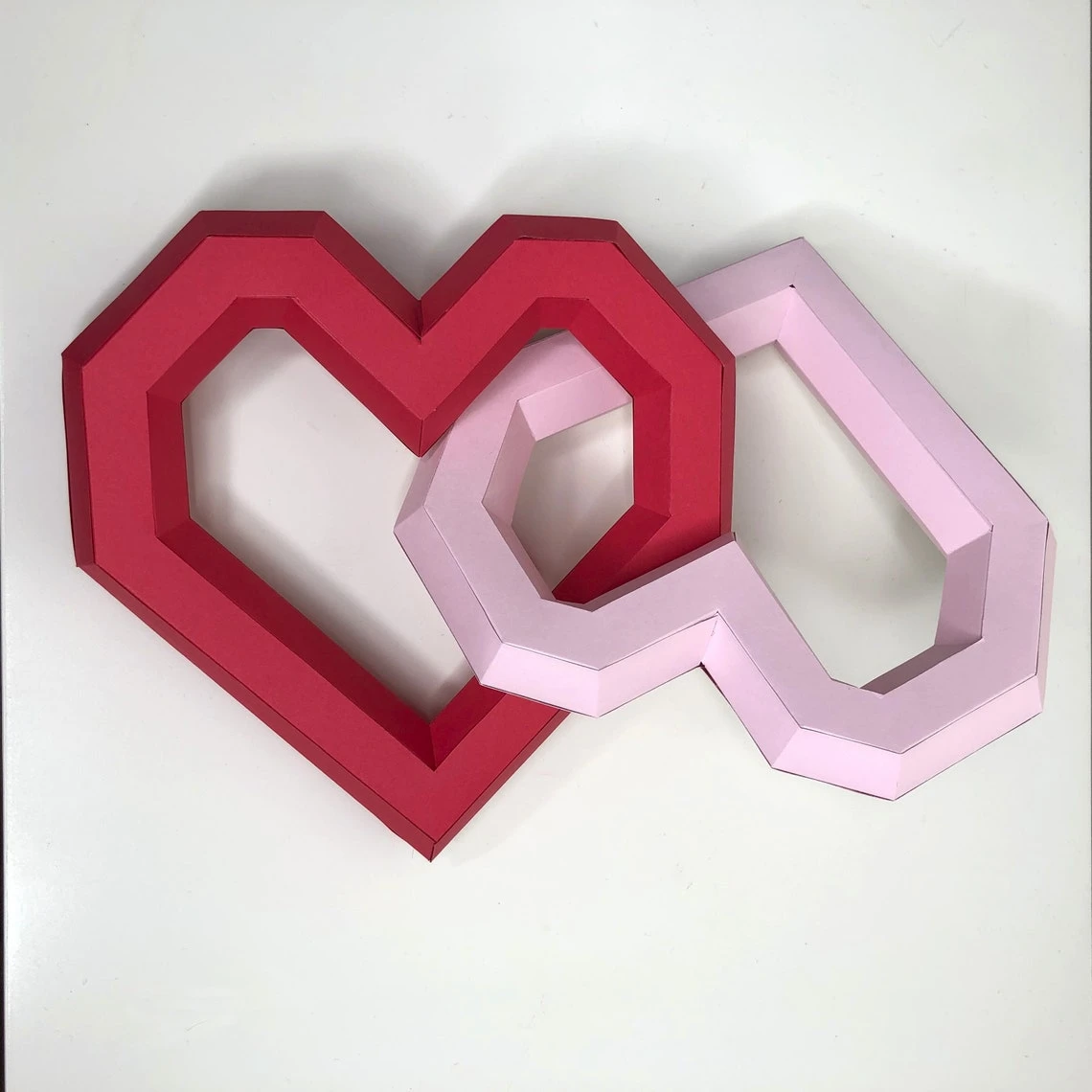 Hearts interlinked 3d papercraft. You get a PDF digital file with templates and instructions for this DIY modern sculpture.